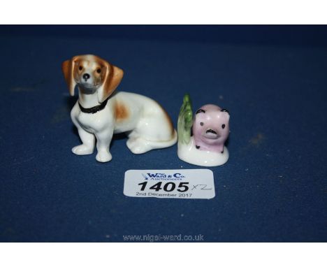 A miniature Goebel; model of a Dachshund and a smaller model of a pink pig c1968