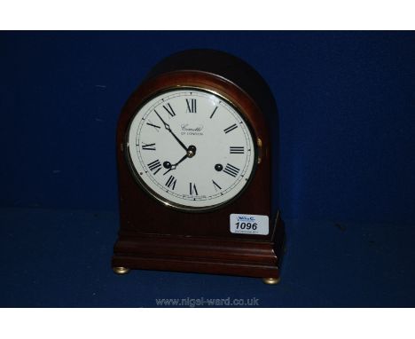 A modern Mahogany cased Mantle Clock by Comilli of London, dome top, case with white Roman numeral face under glass, on brass