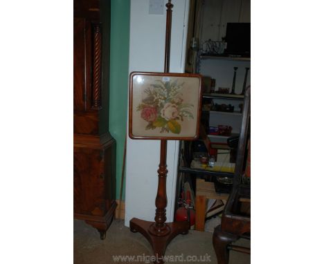 A Victorian Mahogany Pole Firescreen with floral embroidered panel