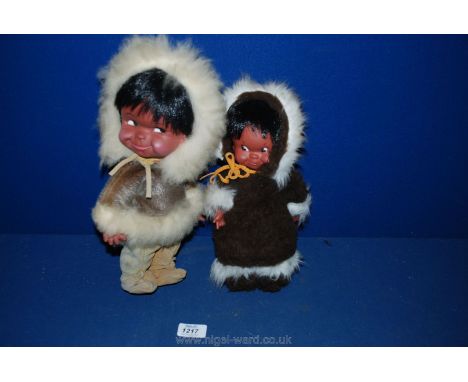 Two vintage Eskimo Dolls with original fur and leather