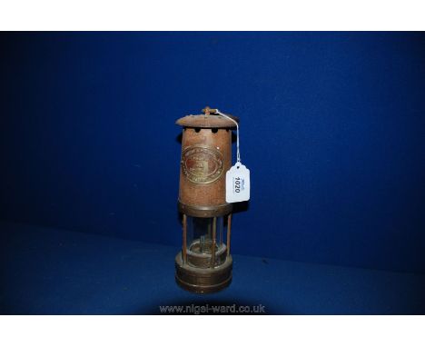 A Thomas & Williams Davey Lamp.