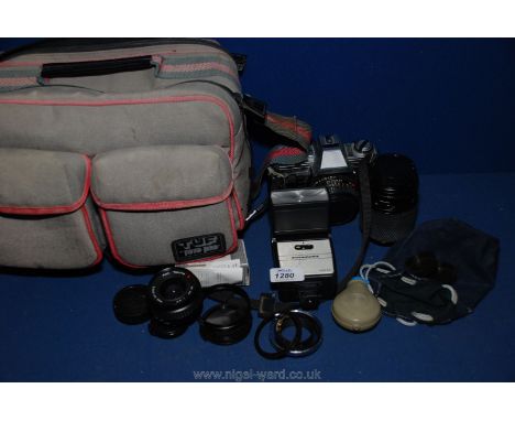 A Minolta X300 Camera and various lenses and accessories