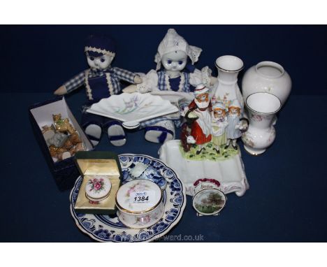 A quantity of china including Delft dolls, musical clock and clog, Wade Whimsies, Yardley Lavender soap dish, vases, trinket 