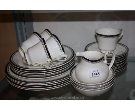A Royal Doulton 'Sarabande' H5023 part Dinner and Tea service including five cups and saucers, five side plates, five dessert