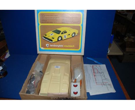 A boxed 1/12 scale Electric Racing Car for 2-function Radio Control (front wheel drive), the body work depicting a Lamborghin