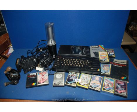 A box of Spectrum ZX and various cassettes, programs, etc., along with a vintage 1960's Bang and Oulfsen Beomic 1000 award wi