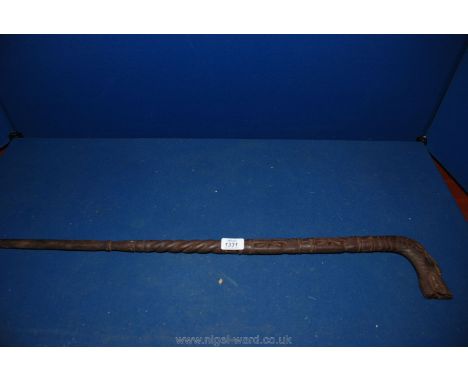 An Eastern carved Walking Stick with dragon's head handle