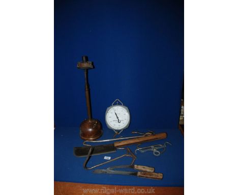 A 1940's Tilly Table Lamp together with a butcher's cleaver, knives, hooks and scales