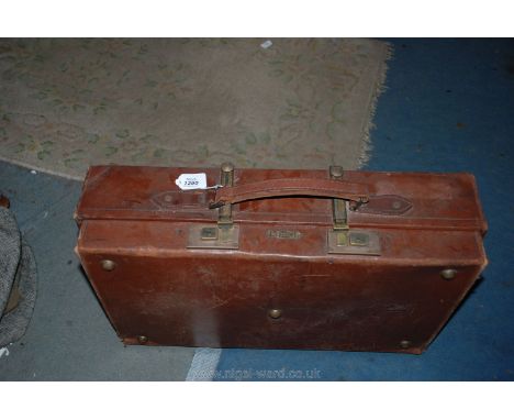 A good quality heavy duty vintage brown Leather Suitcase, with brass locks and expanding straps, by Expandit