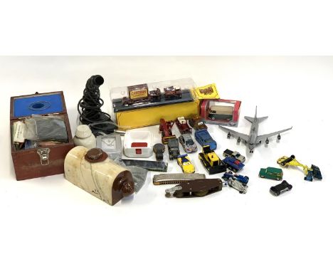 A mixed lot to include die cast and other vehicles, stoneware hot water bottle, Tremola harmonica, Lewmar Emsworth pulley, et