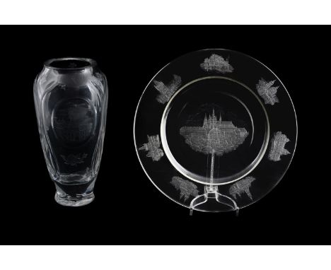 A Czech clear and engraved glass topographical charger, mid-20th century, the centre with a view of Prague castle, within a b