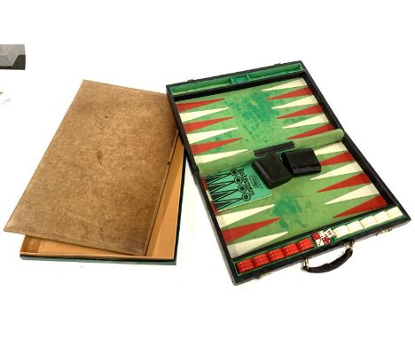 A Harrod's backgammon set, together with a leather folio 