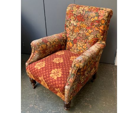 A Victorian armchair on turned legs and ceramic casters, 73cmW