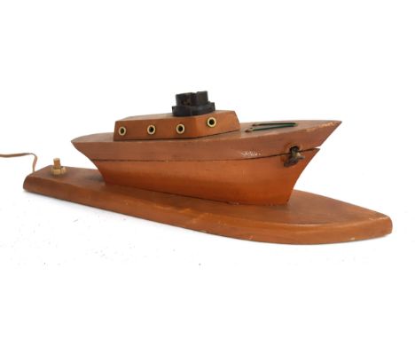 A table lamp in the form of a boat 