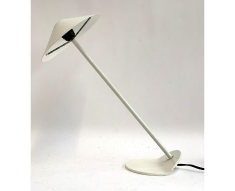 A mid century style white lamp with unusual angled base 
