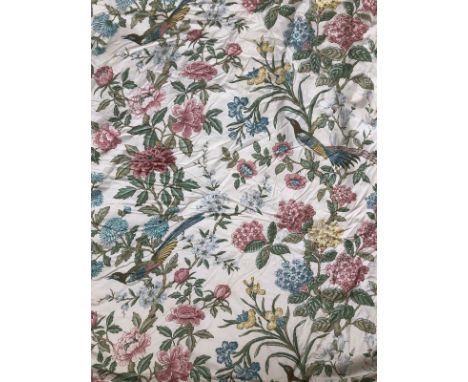A pair of lined and interlined curtains, in an exotic bird print, 290cm wide ungathered, 270cm drop (a little faded) 