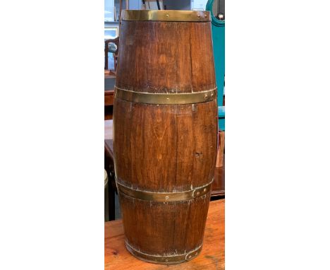 A coopered oak stick stand, with brass banding, 68cmH 