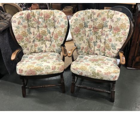 A pair of Ercol style stick back open armchairs with cushions, 76cmW 