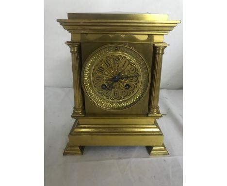 A gilded late 19th century French architectural cased 8-day Marti movement mantel clock striking on a gong: matching numbers 