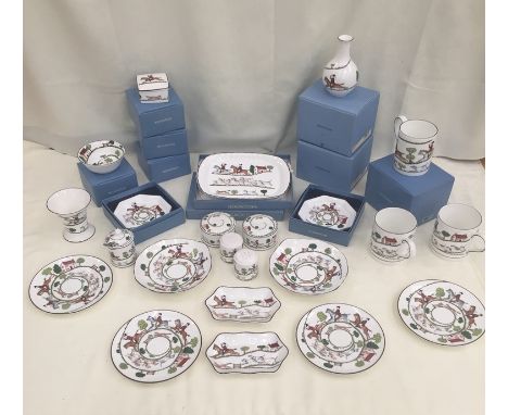 A wedgewood set of plates, dishes etc. depiciting fox hunting scenes