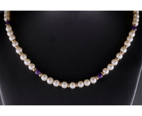 A pearl and amethyst necklace, the approx. 11mm. pearls set with 9ct gold spacer beads and polished amethyst beads, approx. 4