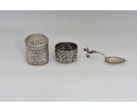 A Persian / Indian white metal lidded pot, pull-off domed cover, all-over repoussé decorated with floral &amp; foliate scroll