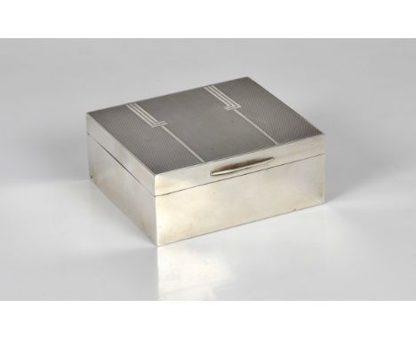 An Art Deco style silver cigarette case, Mappin &amp; Webb Ltd, London, 1937, of rectangular form, the hinged cover with styl