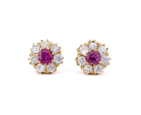 A pair of vintage 18ct gold, ruby and diamond cluster earrings, each round cut ruby within a surround of old mine-cut diamond