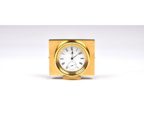 A Patek Philippe key wind pocket watch movement and dial, 1890s, later fitted as a brass cased desk clock with back wind, the