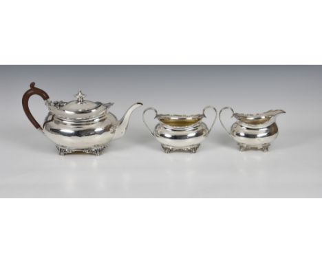 A George V silver three piece tea service, Atkin Brothers, Sheffield, 1933, comprising of teapot, twin handle sugar basin and