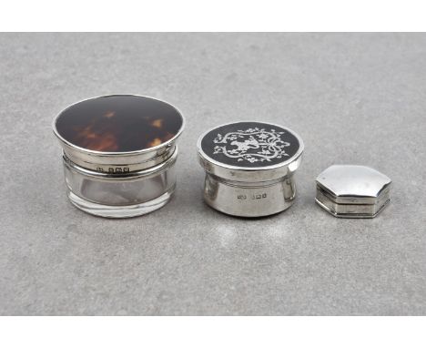 Two silver and tortoiseshell boxes, comprising a circular Edwardian patch box with silver pique work to the lid, Levi &amp; S