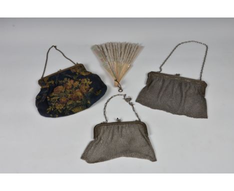 Three vintage / antique evening bags / purses, to include a tapestry style back, featuring flowers in a vase, foliate decorat