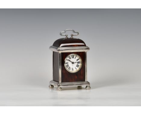 A George V silver and tortoiseshell miniature carriage timepiece, Adie Bros., Birm. 1922, with French eight day single train 