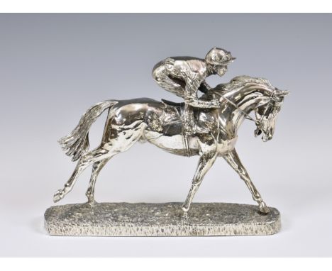 A modern silver mounted model of a racehorse and jockey at the gallop, after R. Donaldson, by Camelot Silverware Ltd, Sheffie