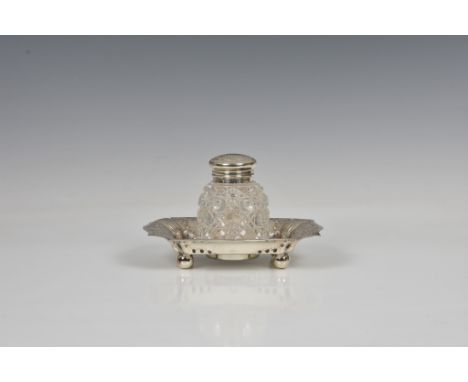 A Victorian silver mounted cut glass inkwell and tray, Atkin Brothers, Sheffield &amp; Birmingham, 1891, the shaped rectangul