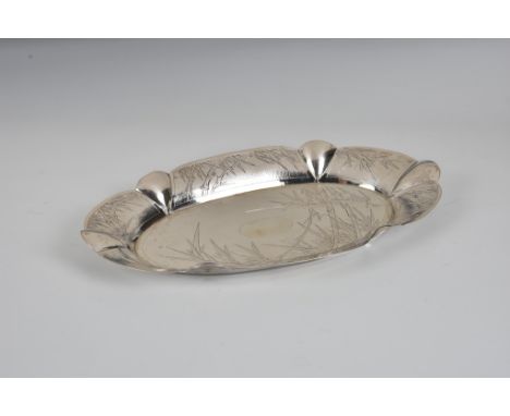 A Chinese silver oval dressing table or jewellery tray, early 20th century, by Suikee, impressed marks to base, the planished