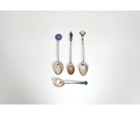 Liberty - A collection of four silver and enamel spoons, comprising one by Liberty &amp; Co., Birm. 1899, 5in. (12.7cm.) long