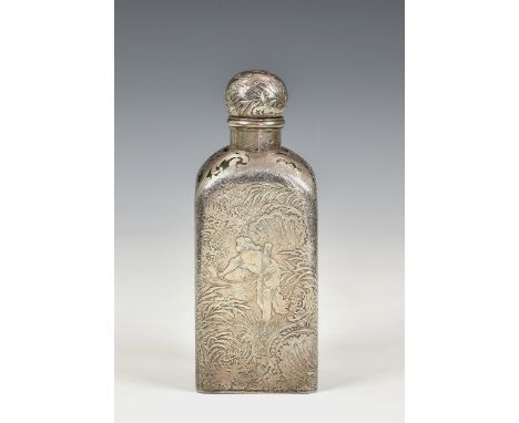 An exceptionally fine quality Continental silver cased glass hunting flask / bottle, of rectangular form, the front finely ch