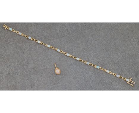 A 14ct yellow gold and opal bracelet, with hourglass links and thirteen oval cabochon opals, hallmarked '14K', 18.5cm. long; 