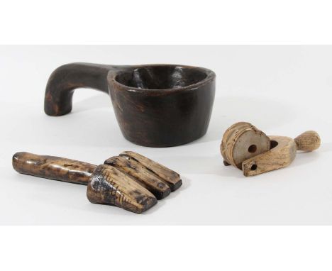 CARVED FRUITWOOD SCOOP length 21cm, together with a carved mortar with handle and a pastry roller (3)