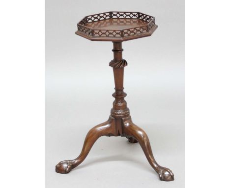 GEORGE III MAHOGANY KETTLE STAND, circa 1790, the octagonal top with 'X' pierced gallery on a turned and wrythen column and t