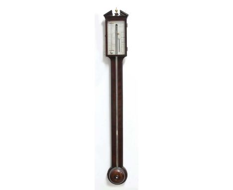 MAHOGANY STICK BAROMETER, the silvered gauge inscribed Denton & Fox, Hull, beneath a broken temple pediment, with a turned ci