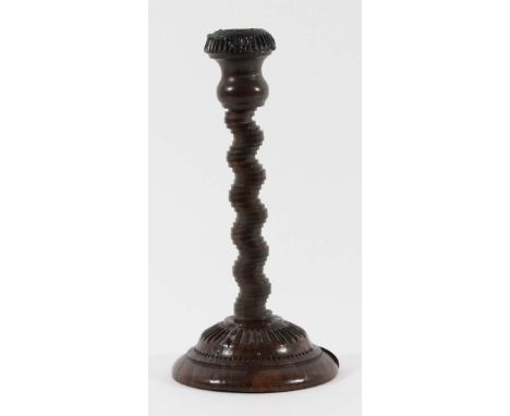 UNUSUAL 'STACKED COIN' CANDLESTICK probably 19th century, with spiral 'stacked coin' stem and domed detailed base, height 25c