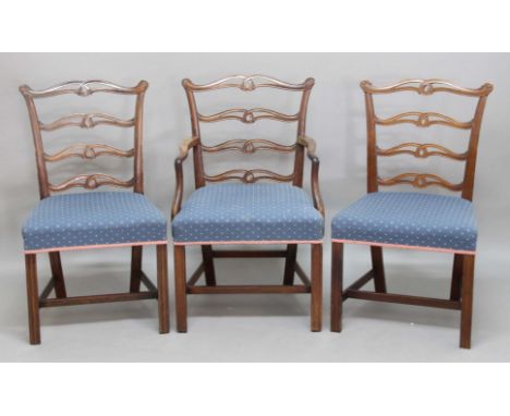 TEN MAHOGANY PIERCED LADDER BACK DINING CHAIRS, early 19th century and later, with foliate carved finials and stuffed over se