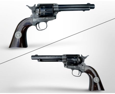 A Umarex Colt Single Action Army six-shot BB revolver, numbered 943 of 1000, with US Marshal grip, with six brass cartridges.