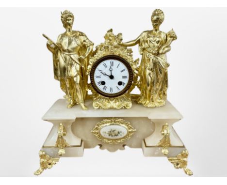 A 19th century French alabaster and gilt metal figural mantel clock, striking on a bell, with pendulum and key, height 36cm. 