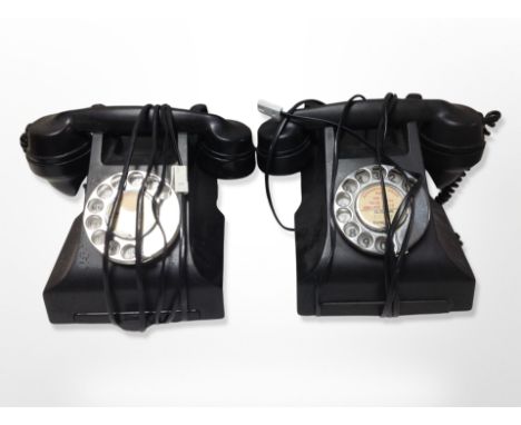 A vintage GPO black bakelite telephone and one other
