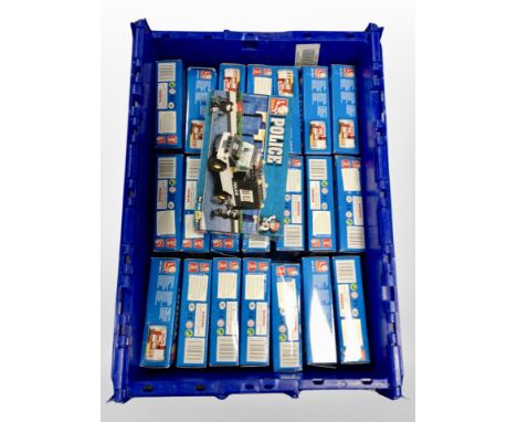 A box of Sluban Police model sets.