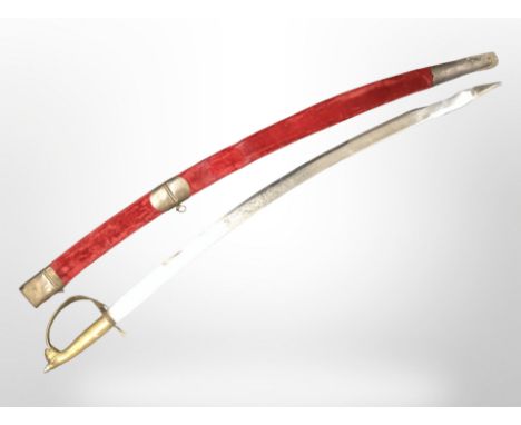 A reproduction Indian sabre in scabbard.