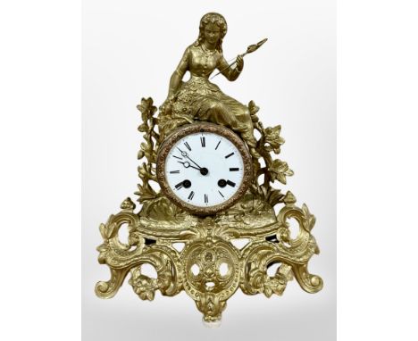 A 19th century French gilt metal figural mantel clock, movement lacking bell, with pendulum and key, height 31cm. 